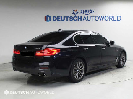 BMW 5-Series — photo 04