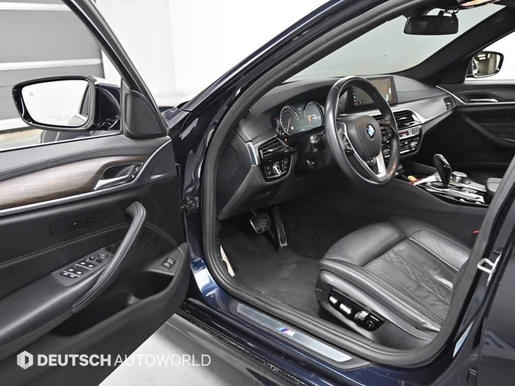 BMW 5-Series — photo 11