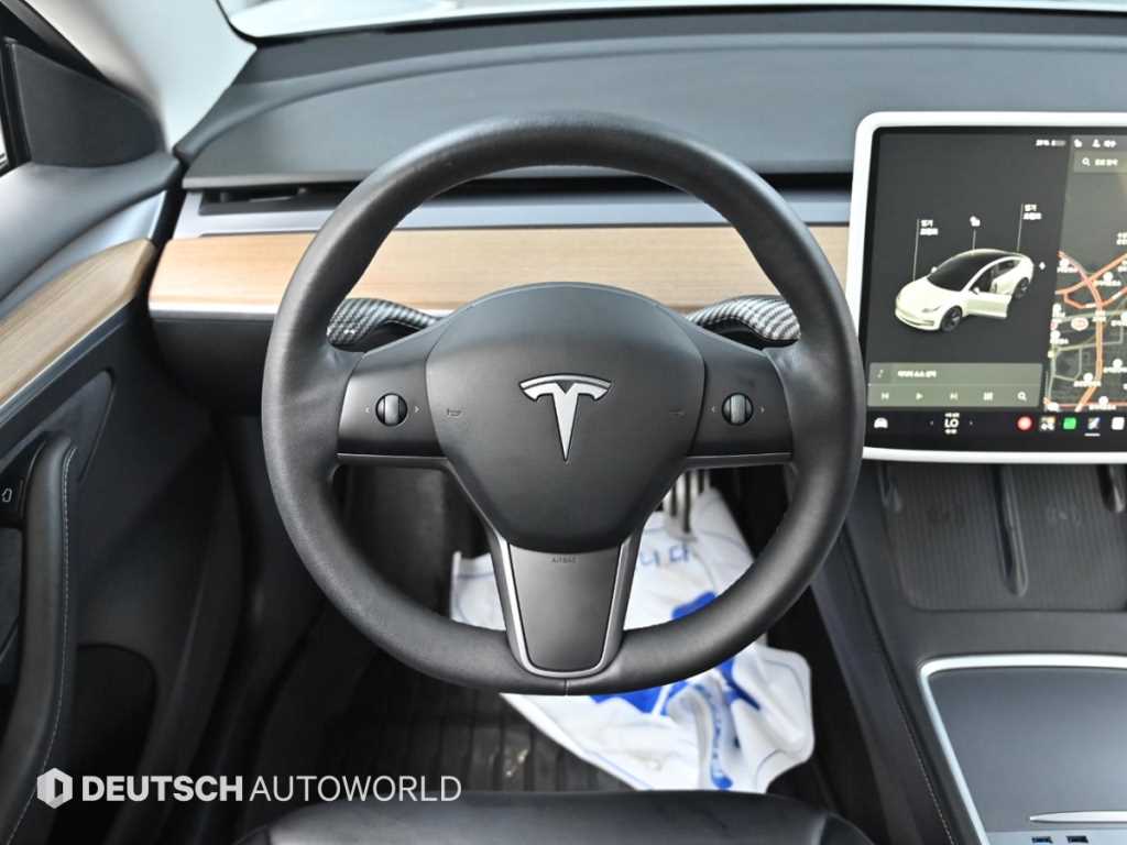 Tesla Model 3 — photo 13