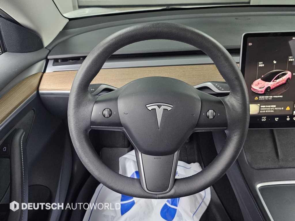Tesla Model 3 — photo 13