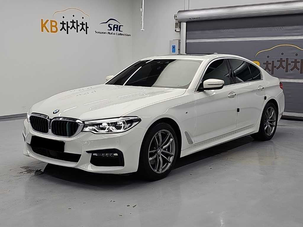 BMW 5-Series — photo 01