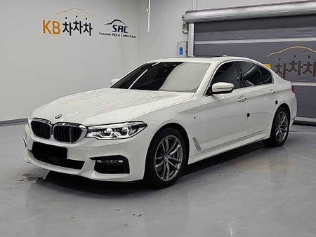 BMW 5-Series — photo 01