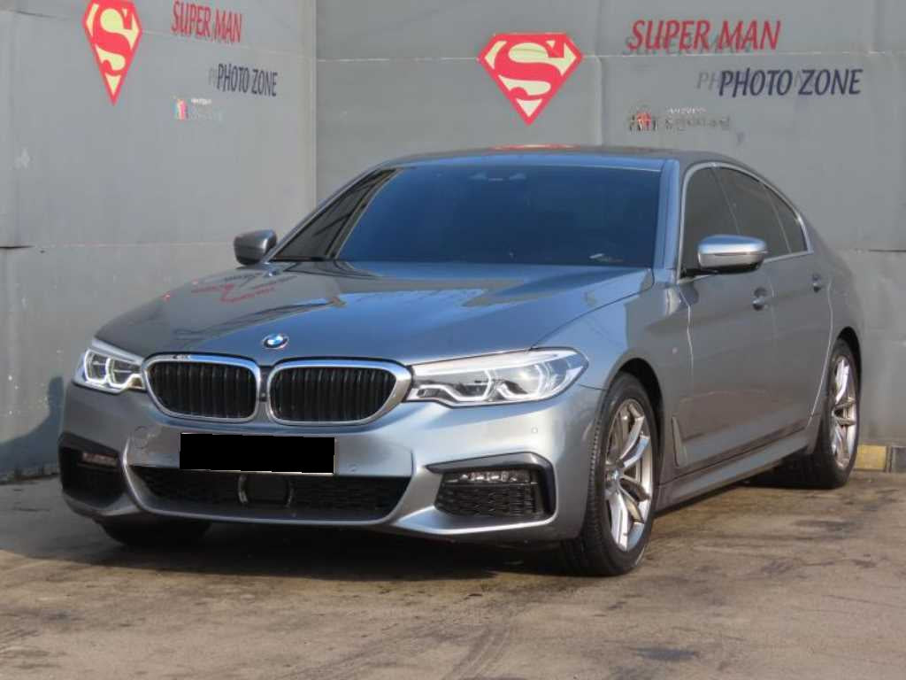 BMW 5-Series — photo 01