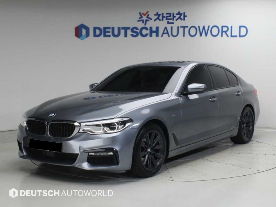 BMW 5-Series — photo 01