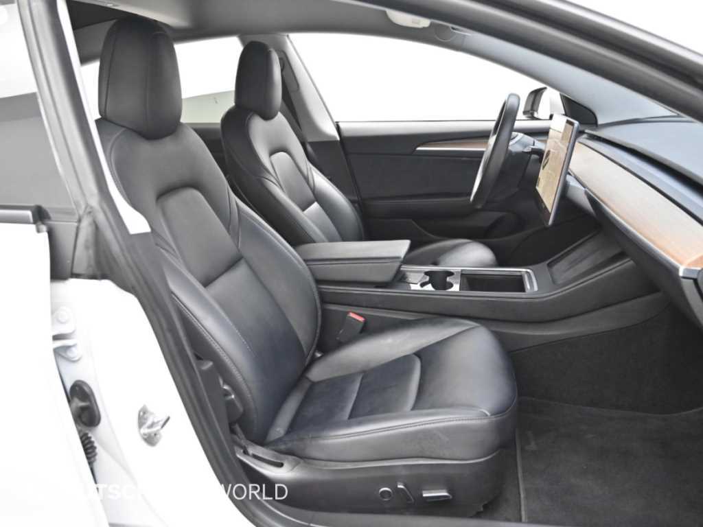 Tesla Model 3 — photo 10
