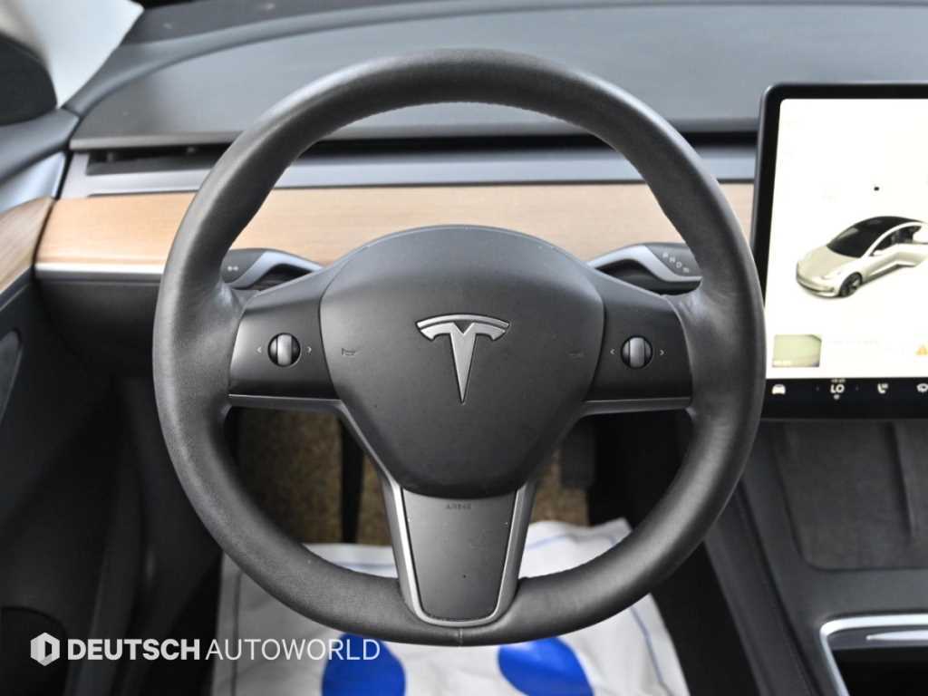 Tesla Model 3 — photo 13
