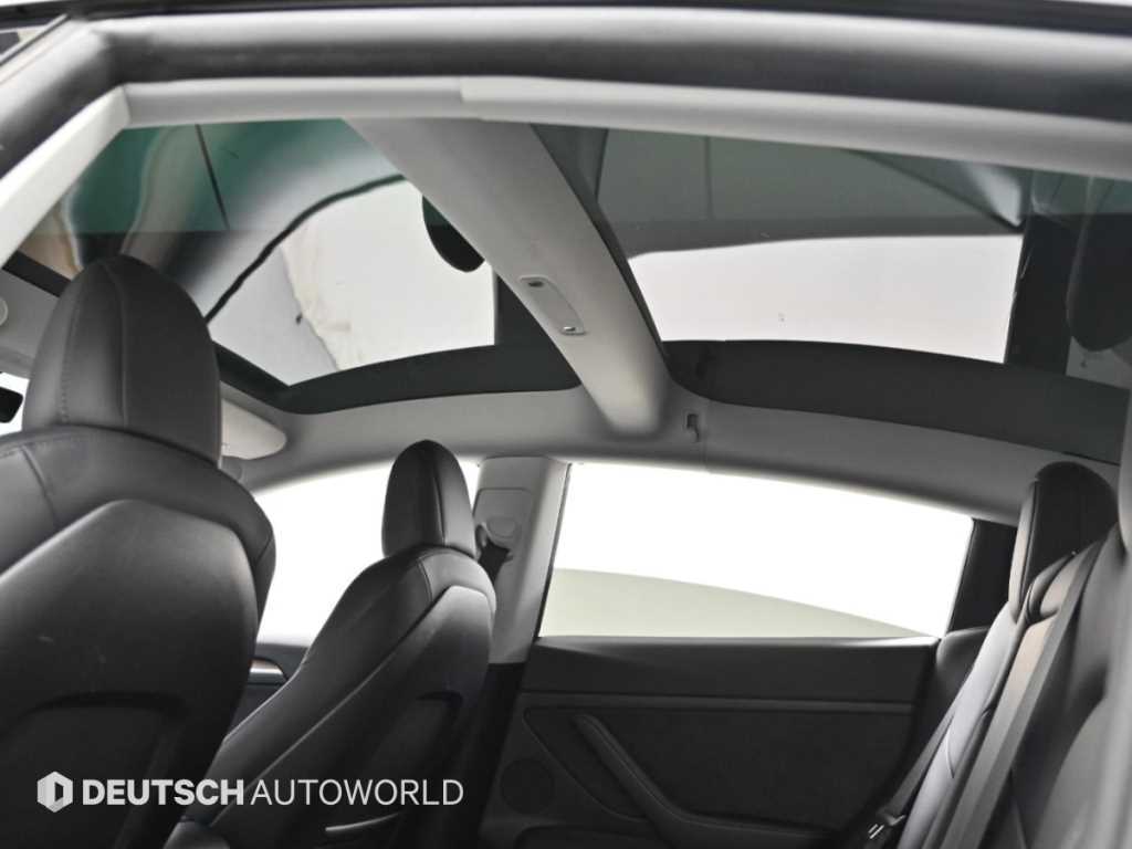 Tesla Model 3 — photo 18