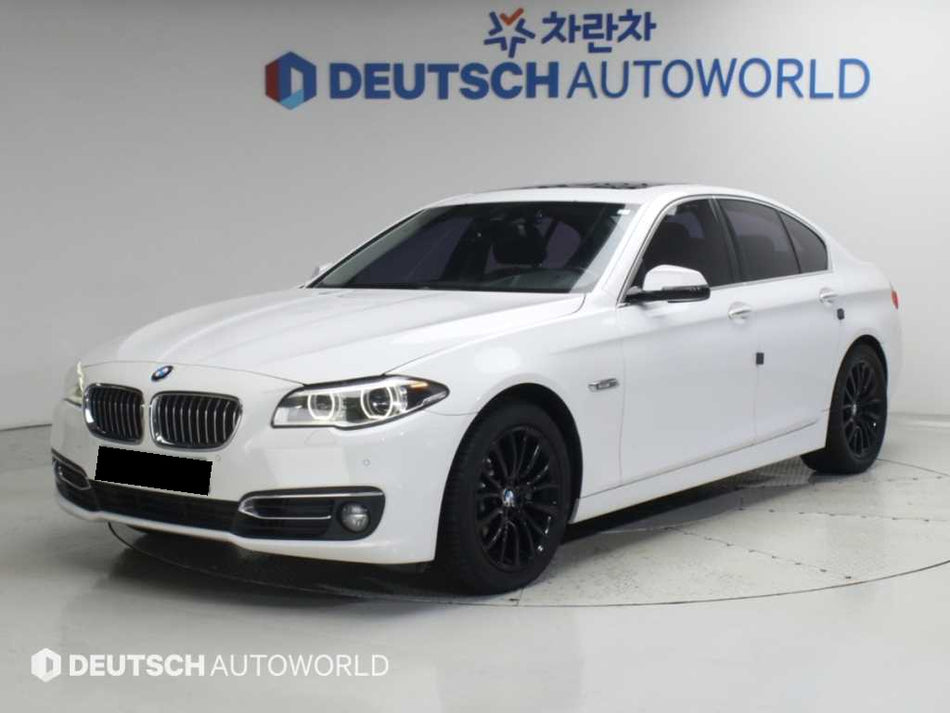 BMW 5-Series — photo 01