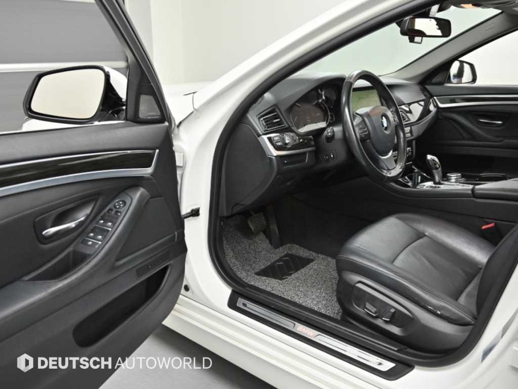 BMW 5-Series — photo 11