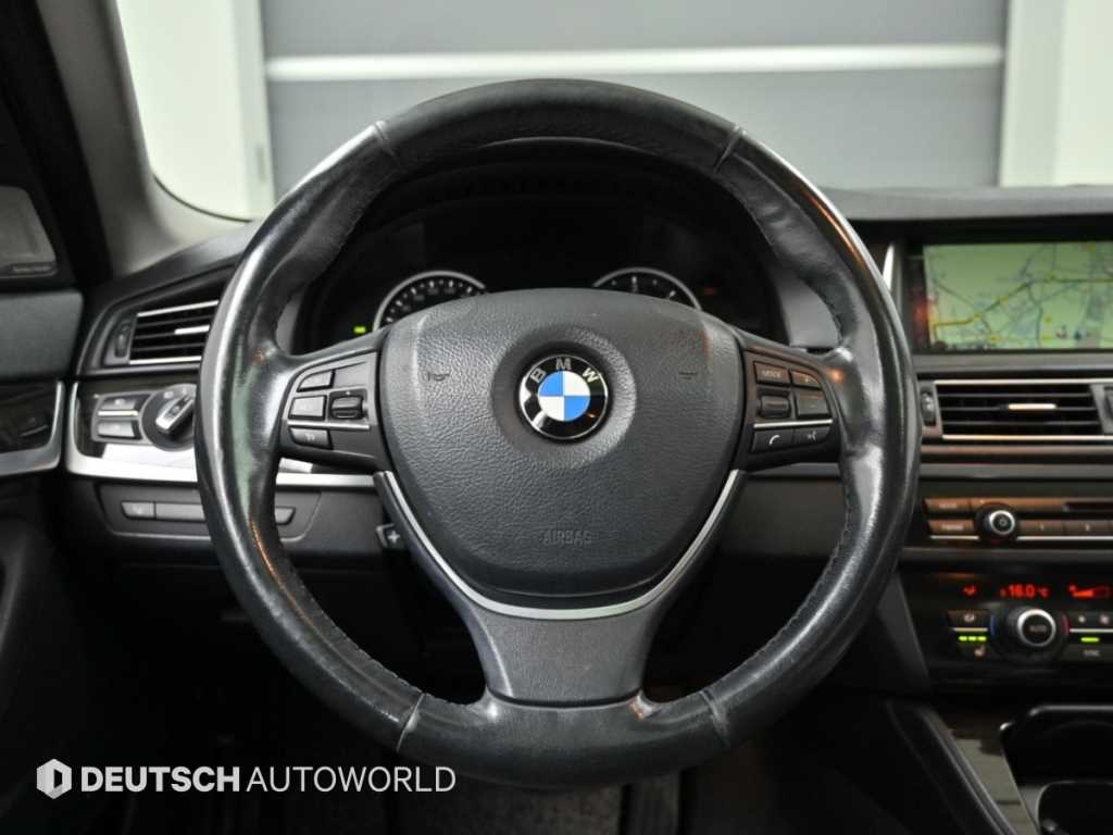 BMW 5-Series — photo 13