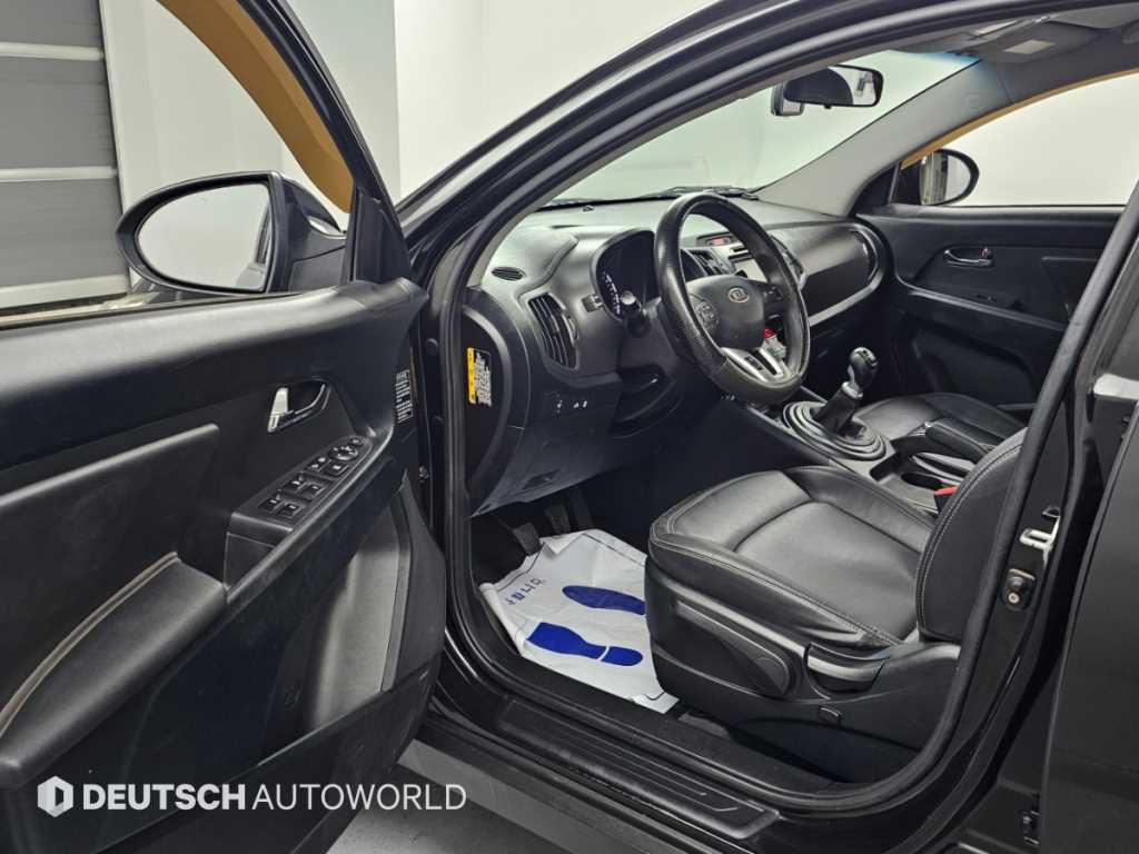 Kia Sportage — photo 11