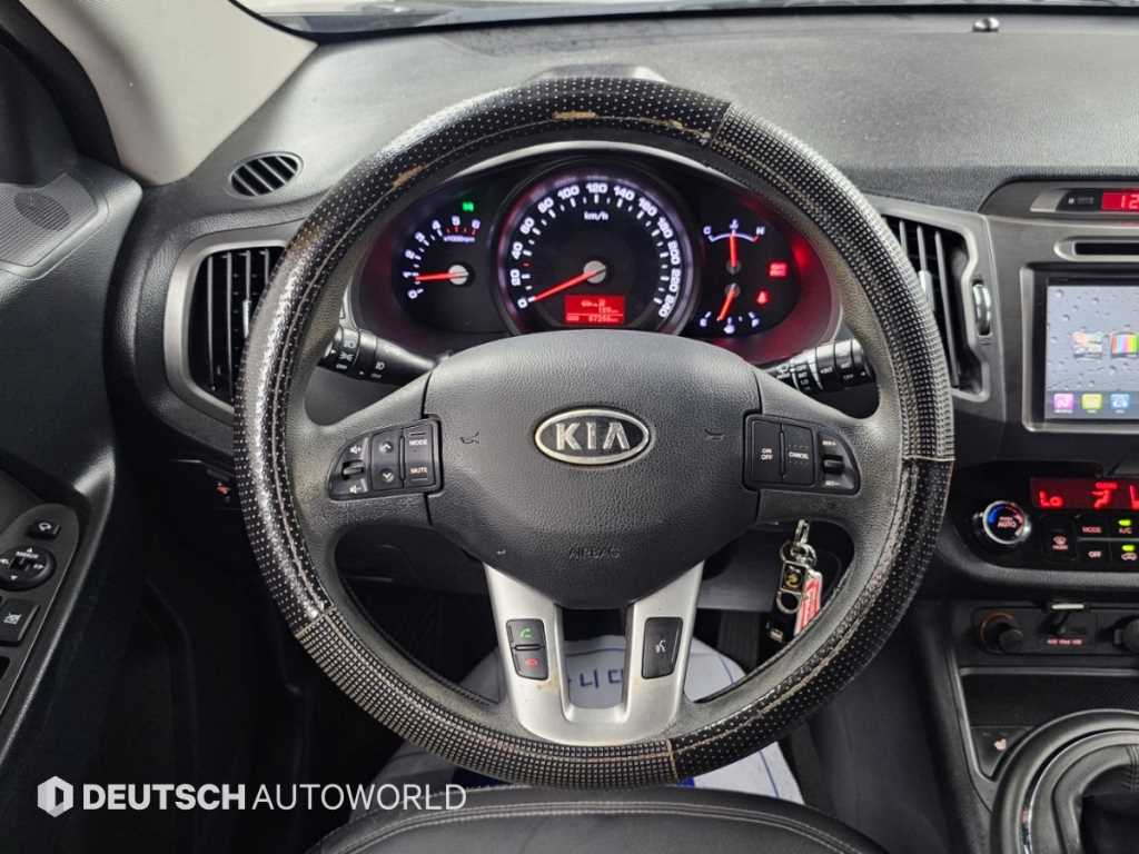 Kia Sportage — photo 13