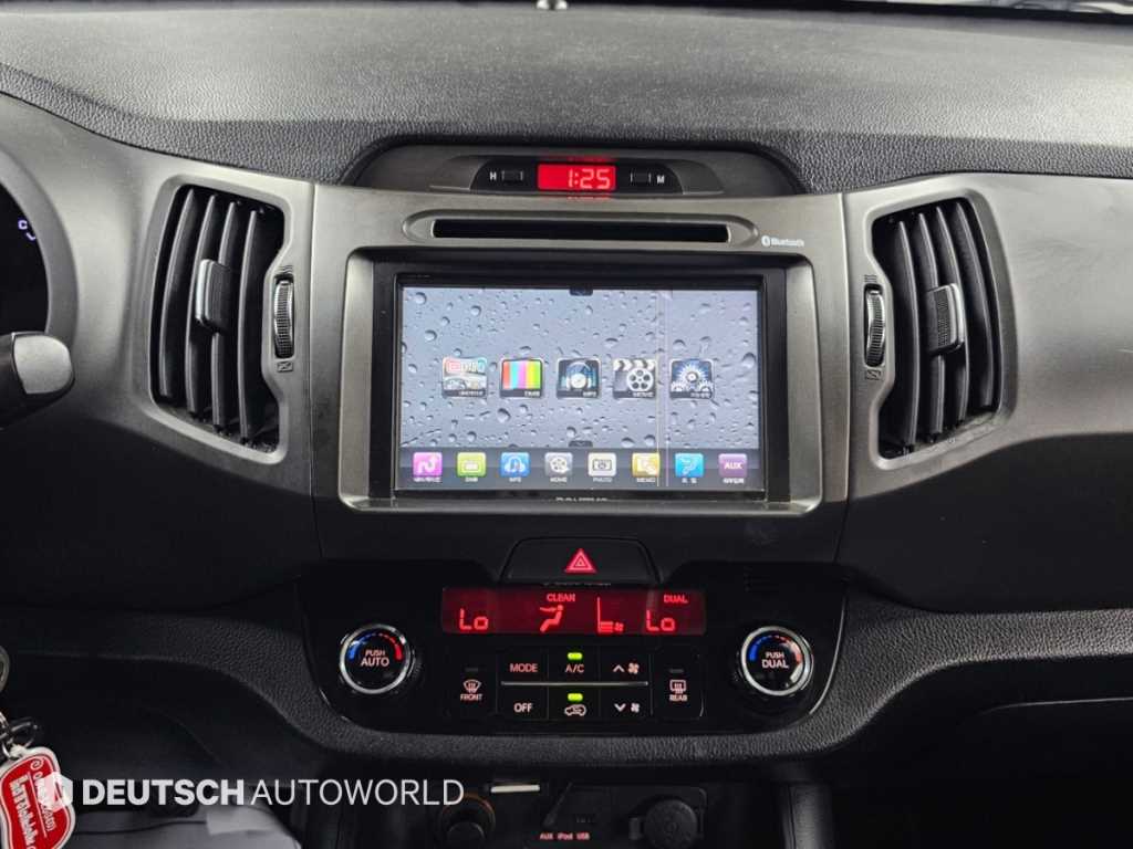 Kia Sportage — photo 14