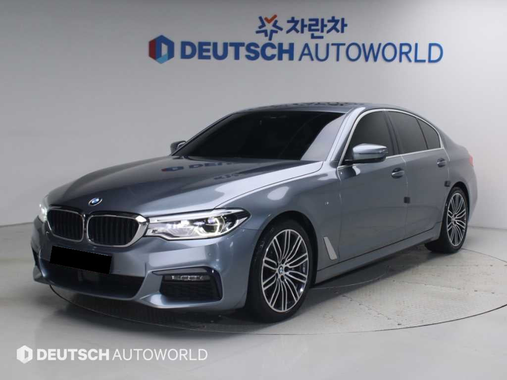 BMW 5-Series — photo 01