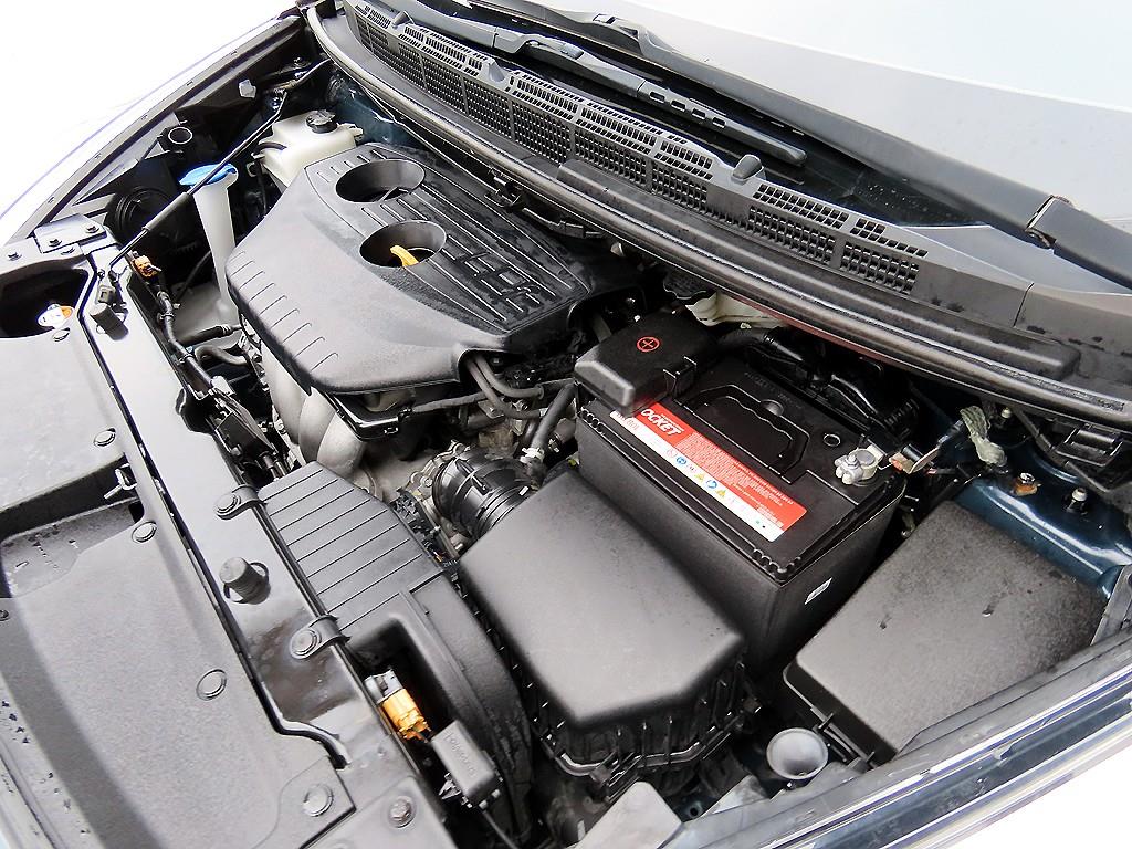 Kia Carens — photo 19