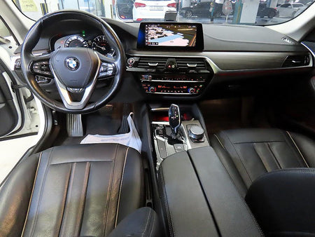 BMW 5-Series — photo 10