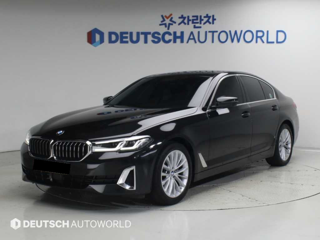 BMW 5-Series — photo 01