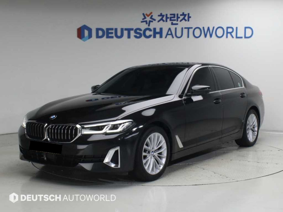 BMW 5-Series — photo 01