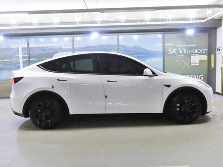 Tesla Model Y — photo 03