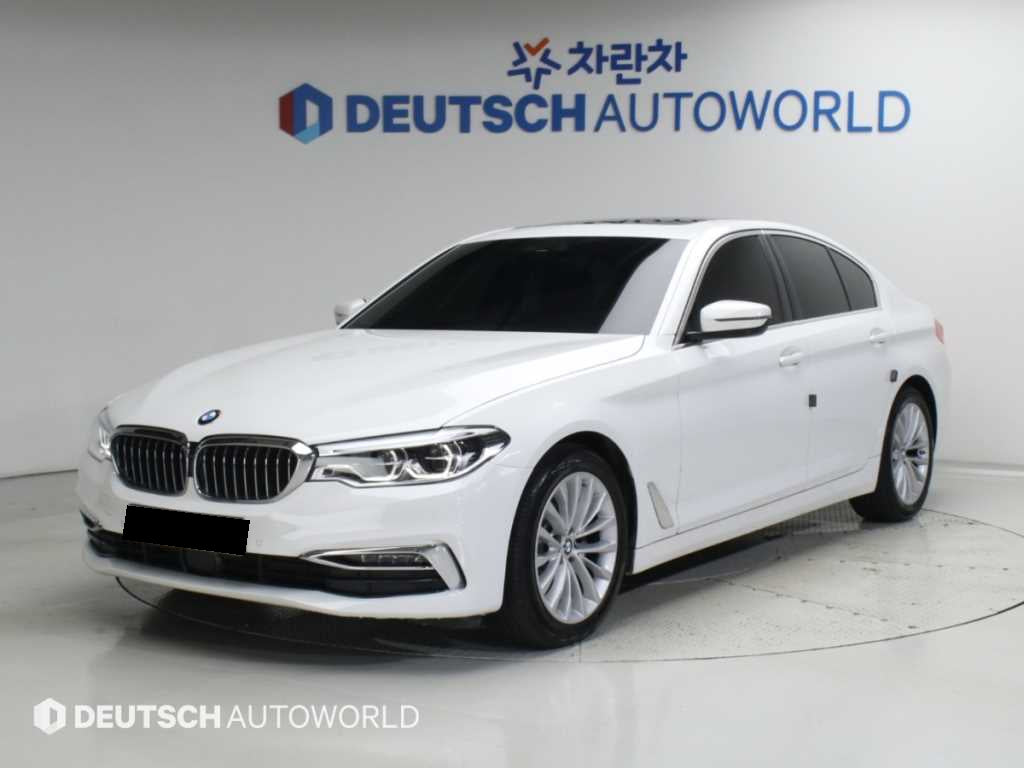 BMW 5-Series — photo 01