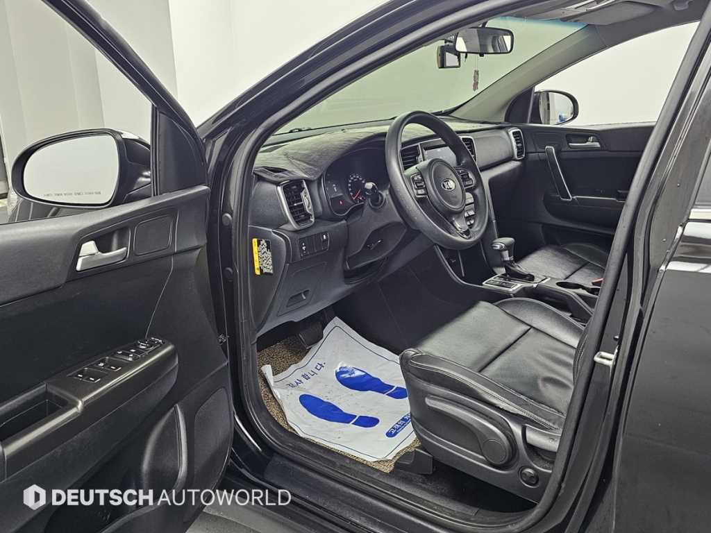 Kia Sportage — photo 11