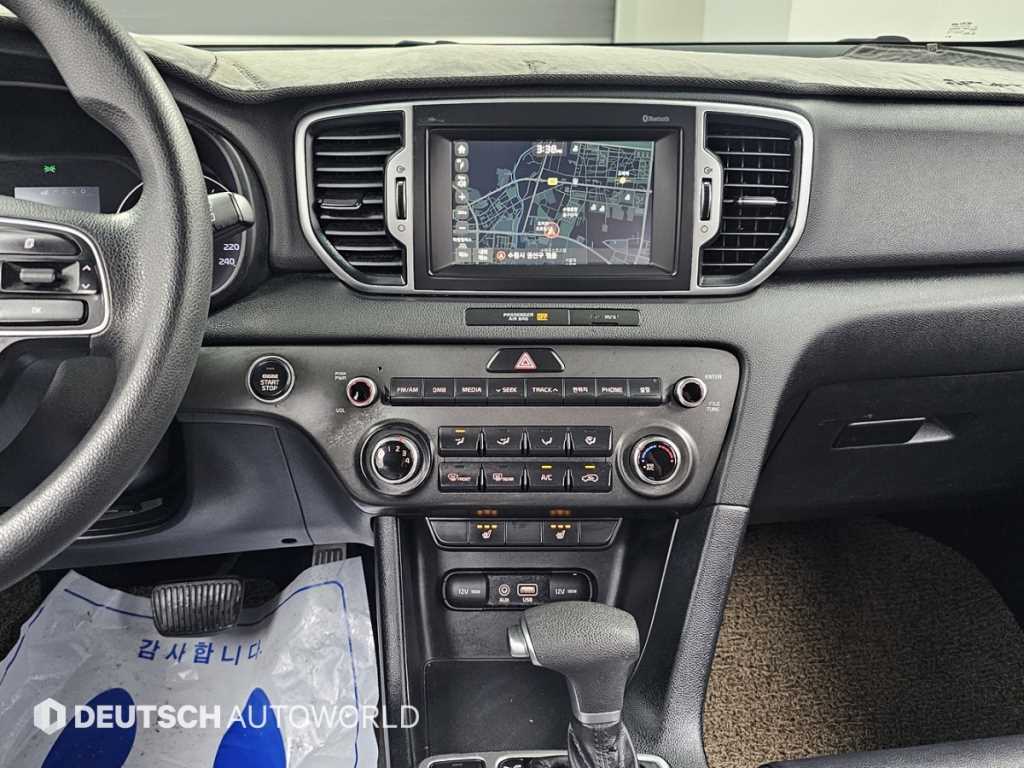 Kia Sportage — photo 14