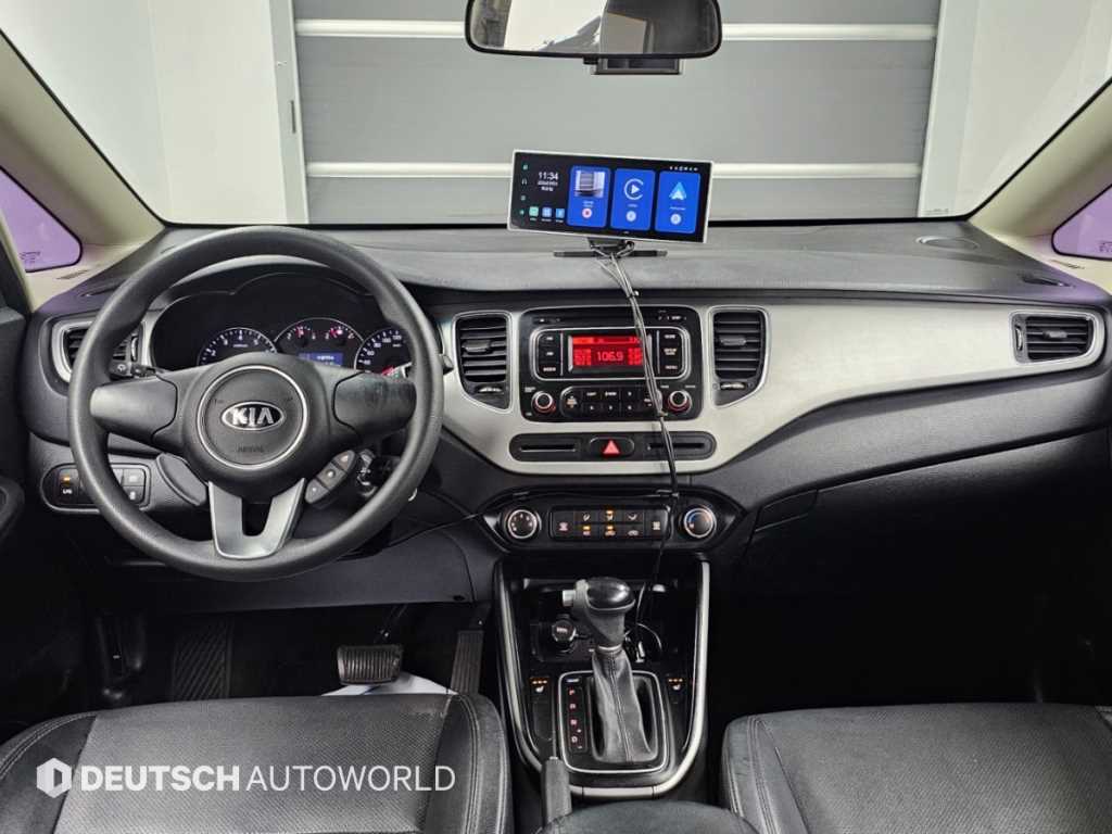 Kia Carens — photo 07