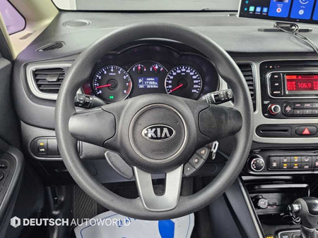 Kia Carens — photo 13