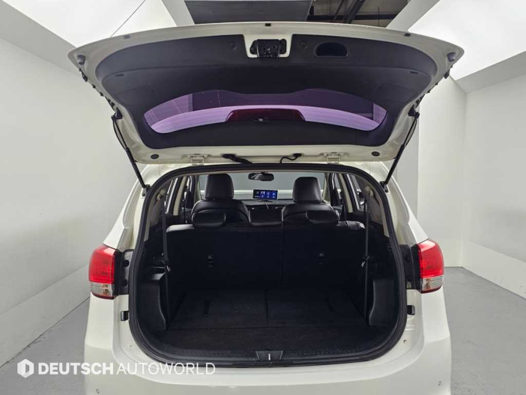 Kia Carens — photo 19