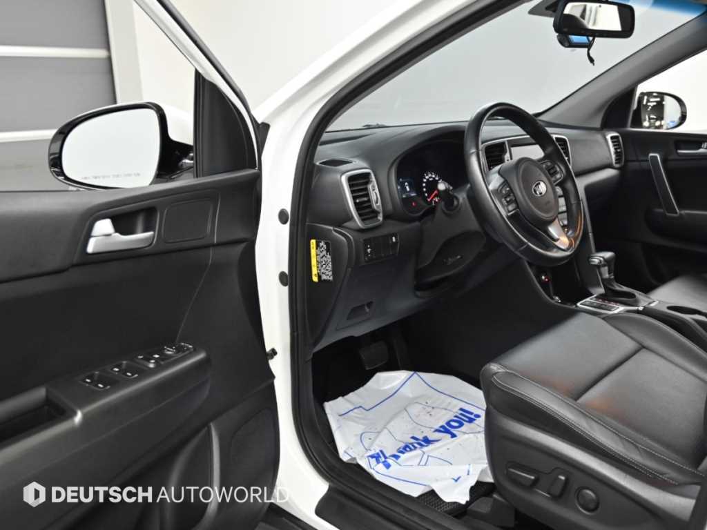 Kia Sportage — photo 11