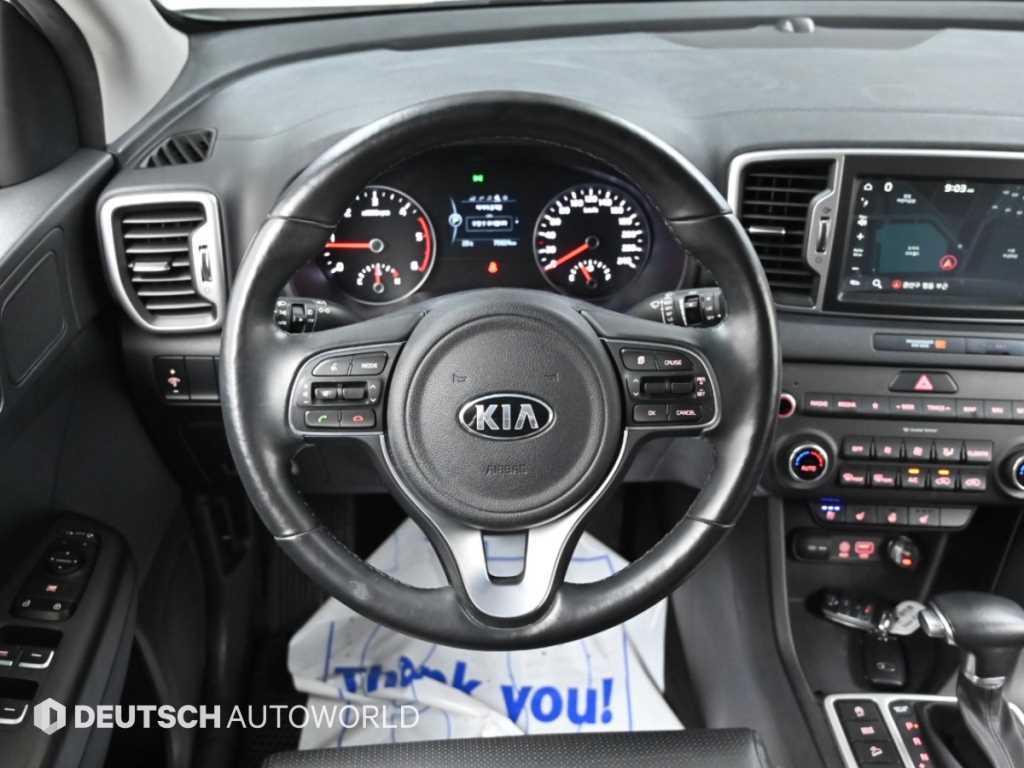 Kia Sportage — photo 13