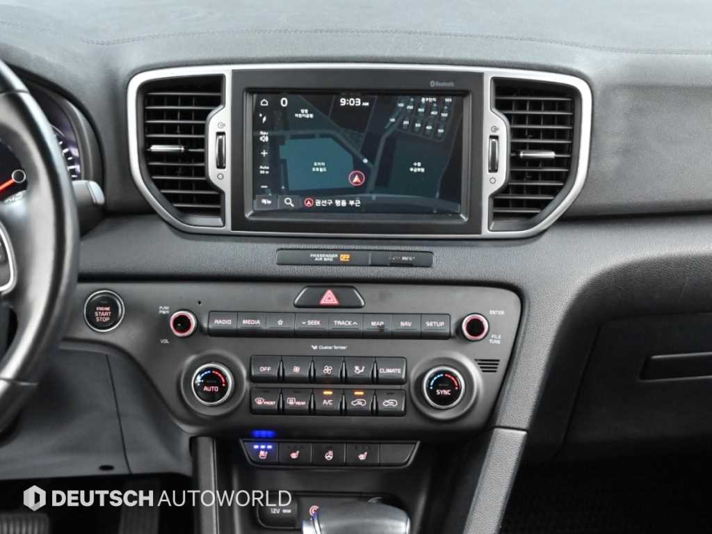 Kia Sportage — photo 14