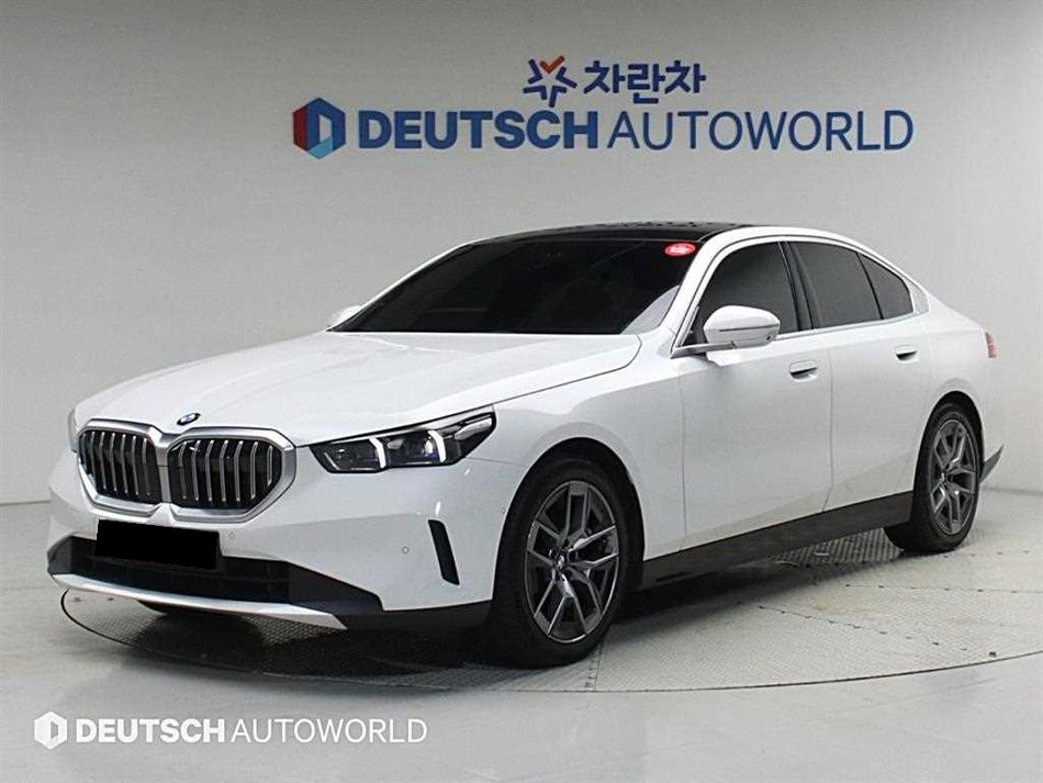 BMW 5-Series — photo 01