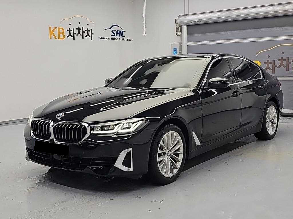 BMW 5-Series — photo 01