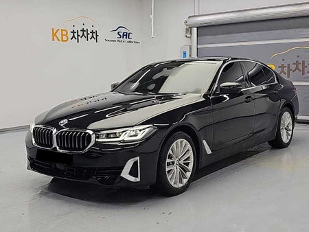 BMW 5-Series — photo 01