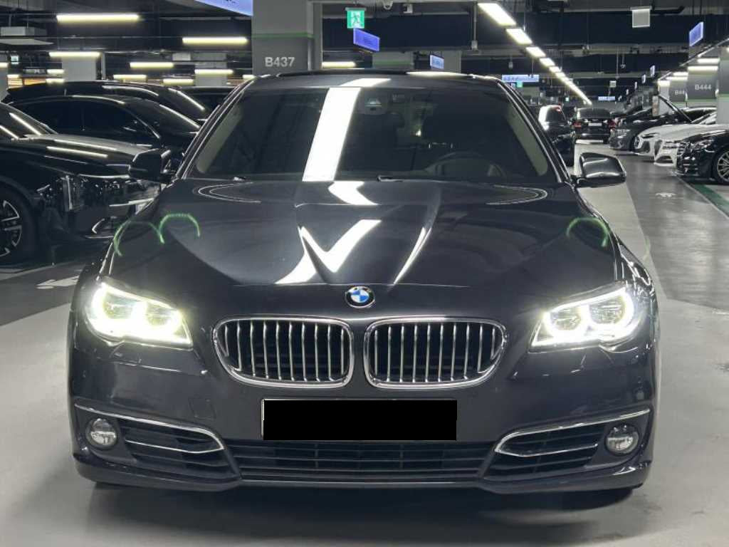 BMW 5-Series — photo 01