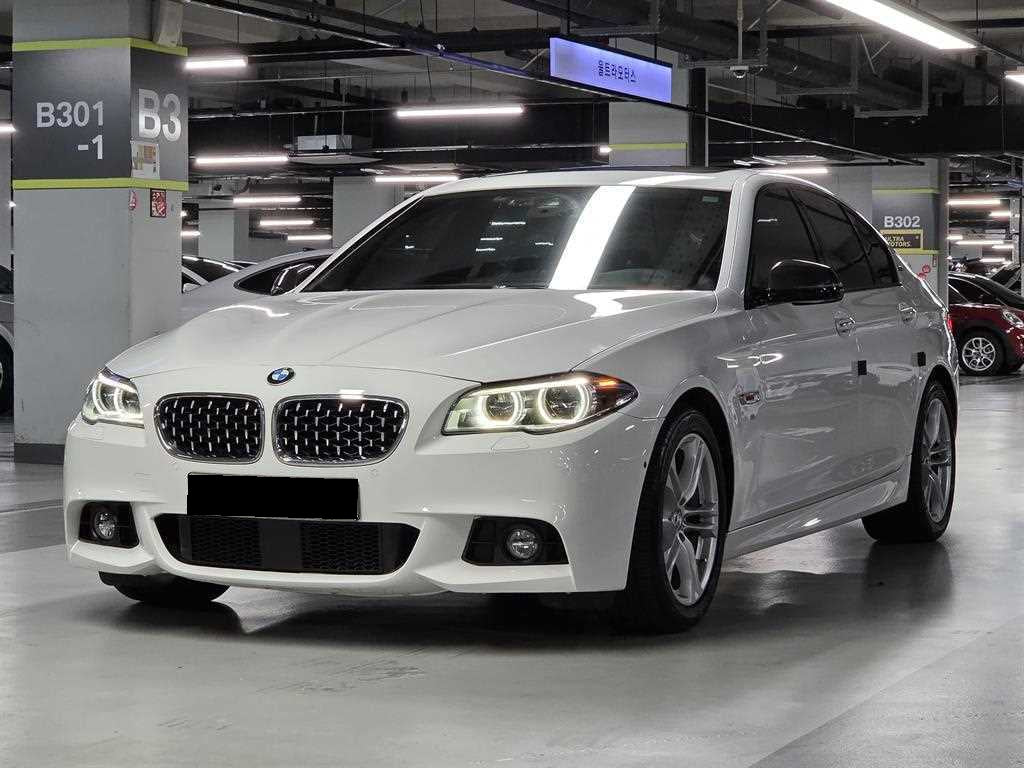 BMW 5-Series — photo 01