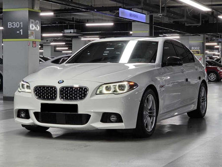 BMW 5-Series — photo 01