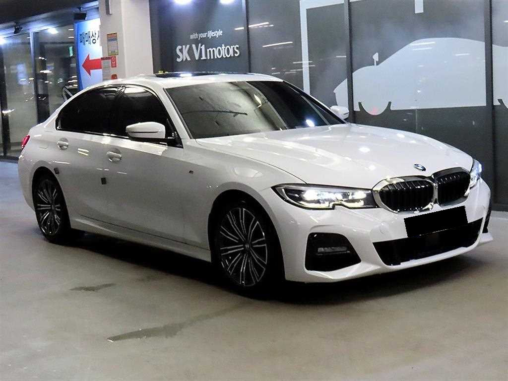 BMW 3-Series — photo 01
