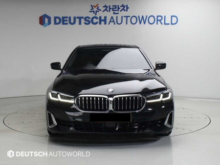 BMW 5-Series — photo 01