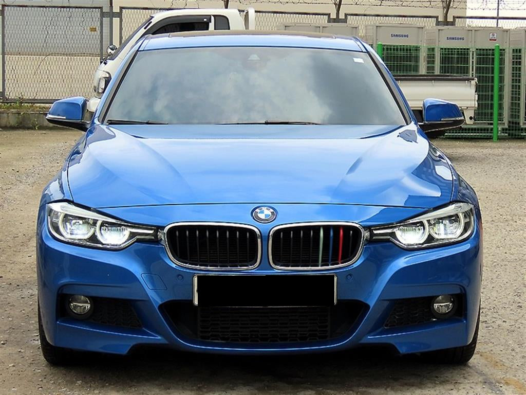 BMW 3-Series — photo 01