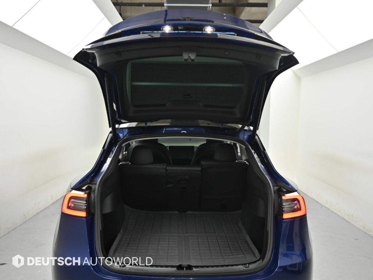 Tesla Model Y — photo 19