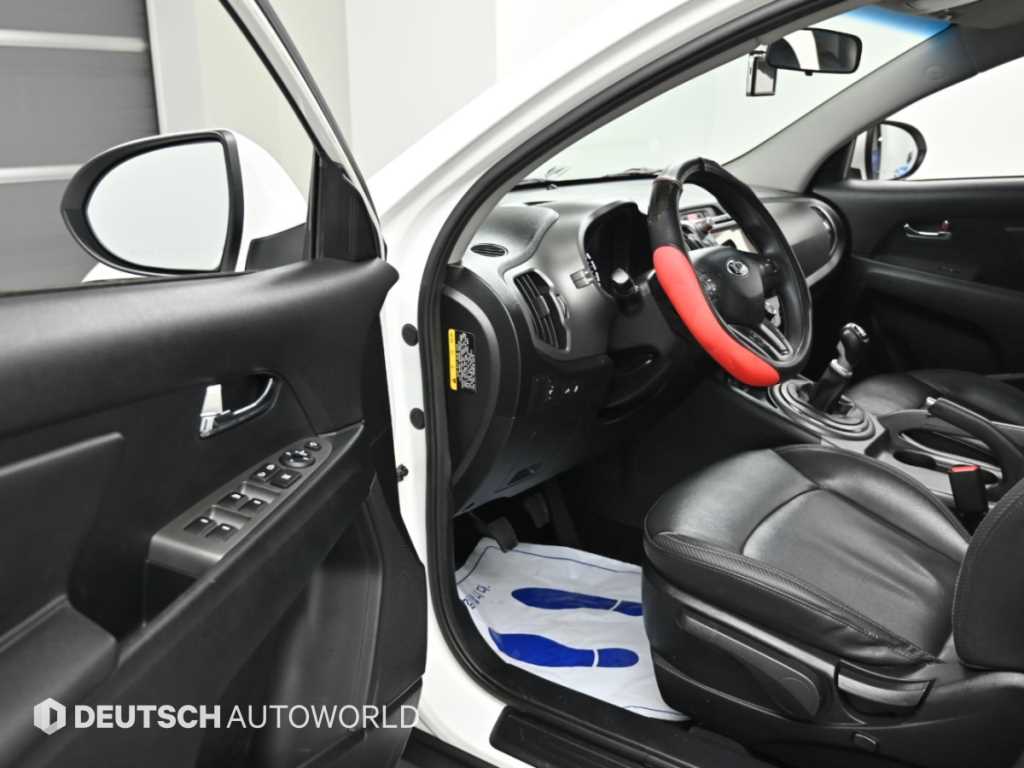 Kia Sportage — photo 11