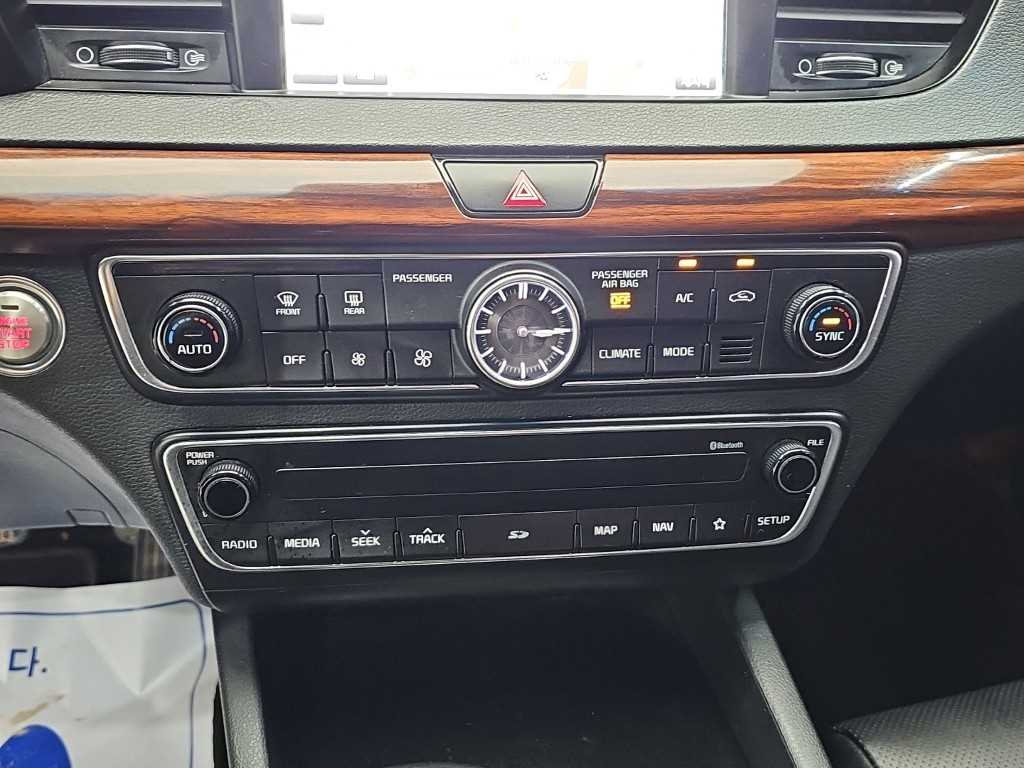 Kia K7 — photo 10