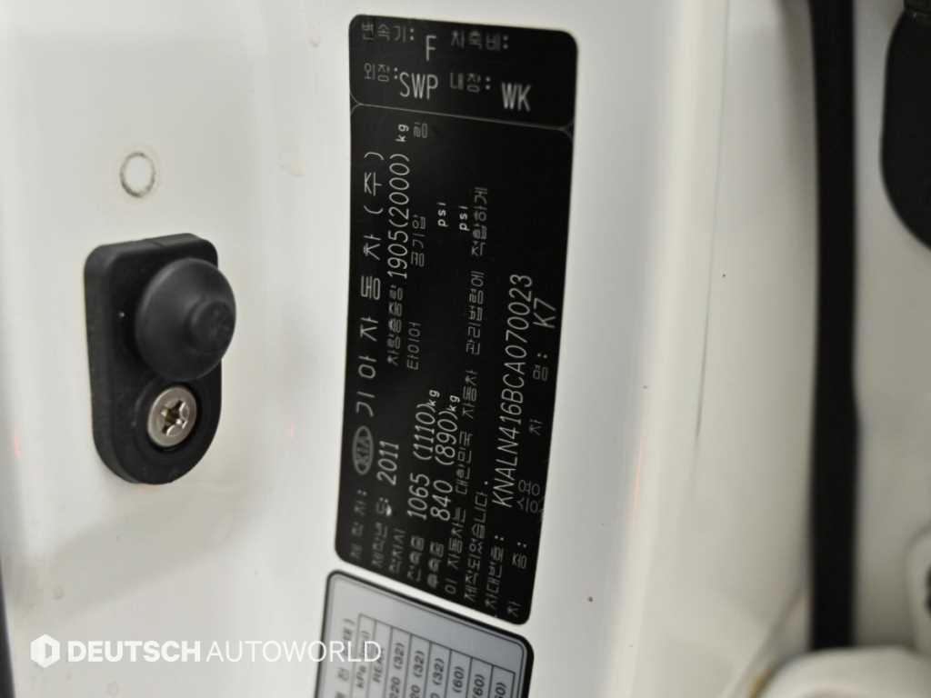 Kia K7 — photo 20