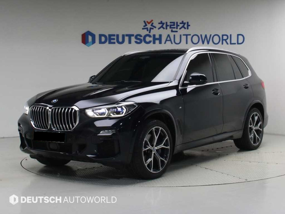 BMW X5 — photo 01