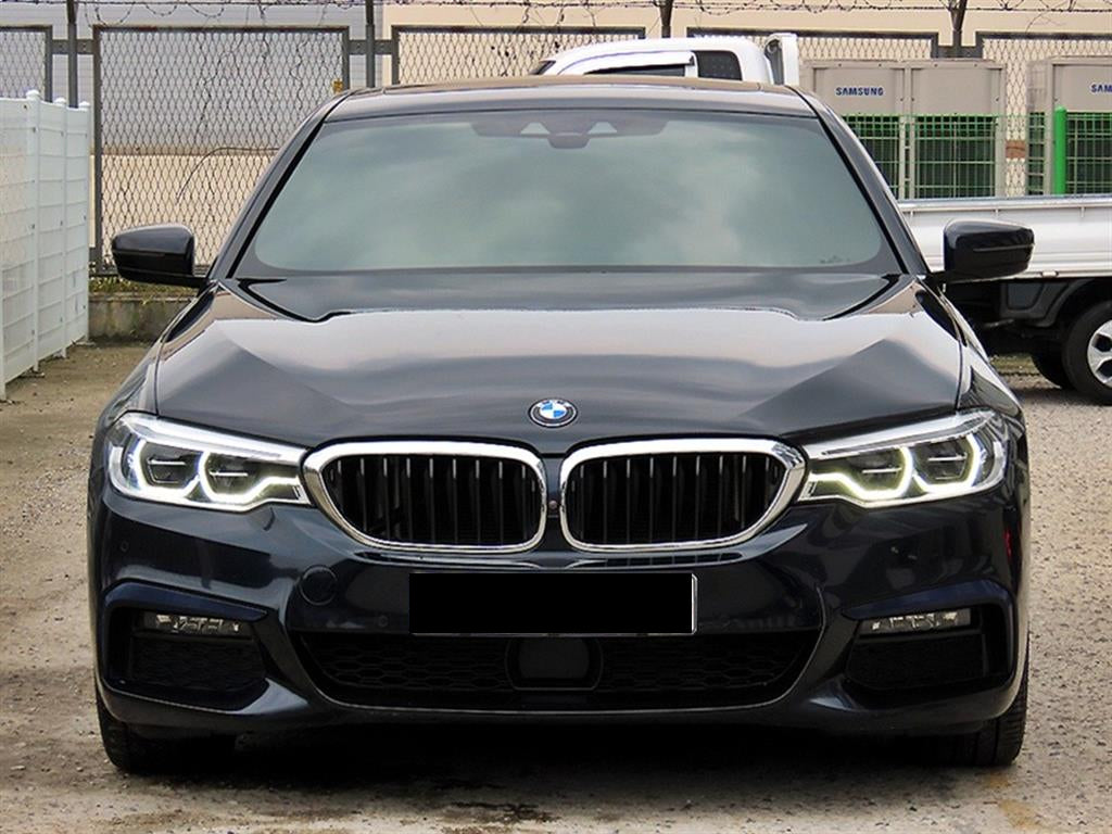 BMW 5-Series — photo 01