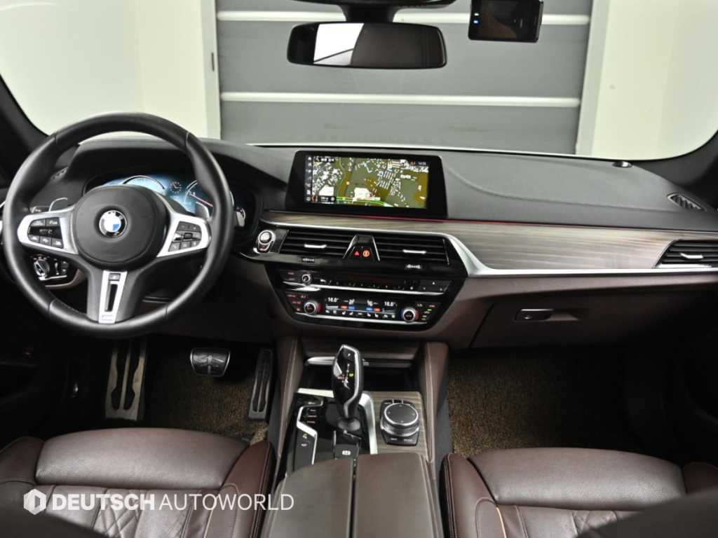BMW 5-Series — photo 09