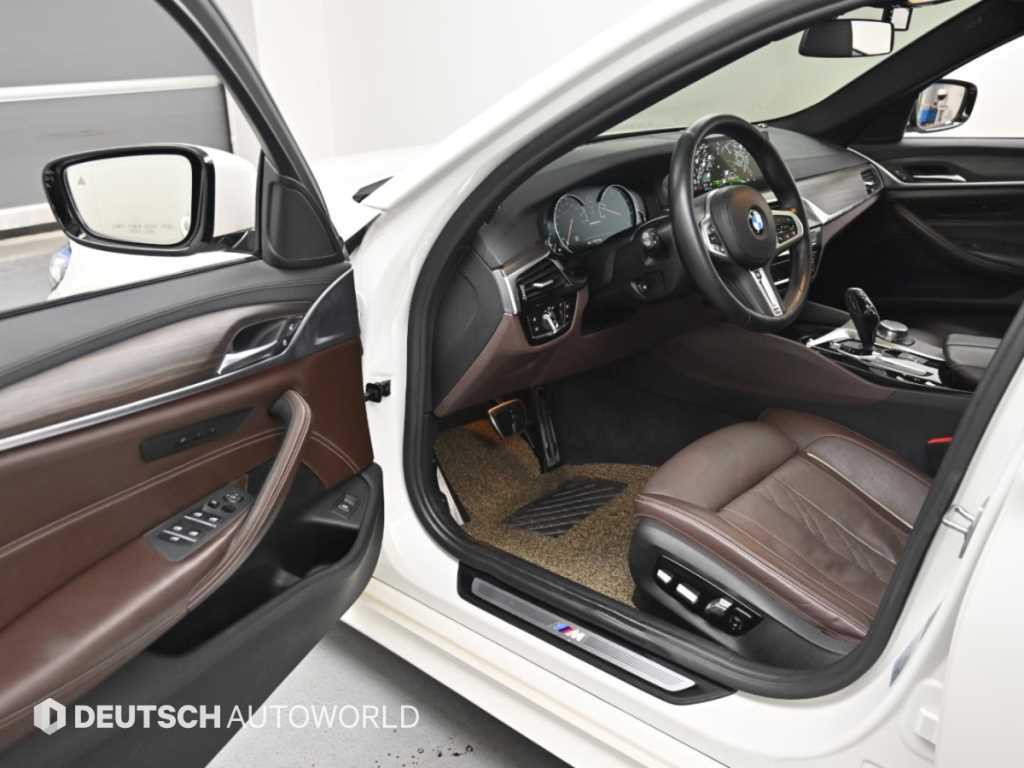 BMW 5-Series — photo 13