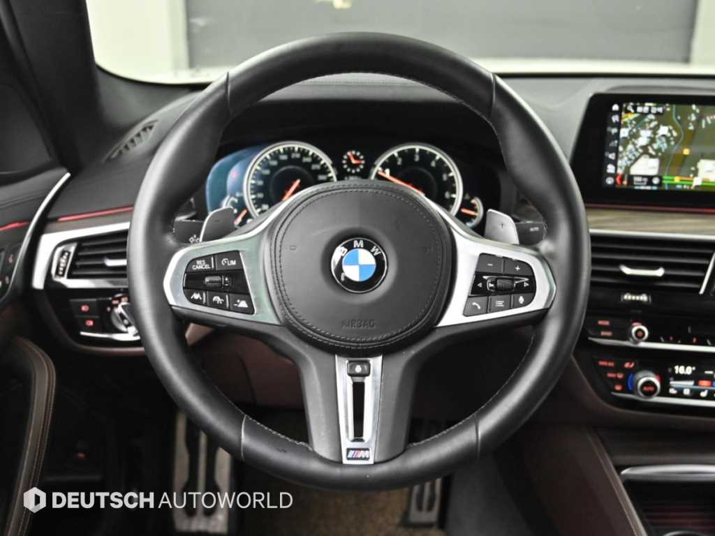 BMW 5-Series — photo 15